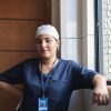 Portrait of female doctor or nurse in medical scrubs